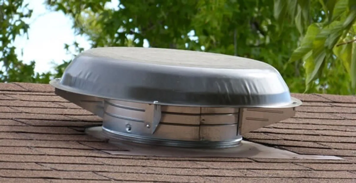 attic fan installation services with low-profile roof ventilation unit in Bellevue, WA