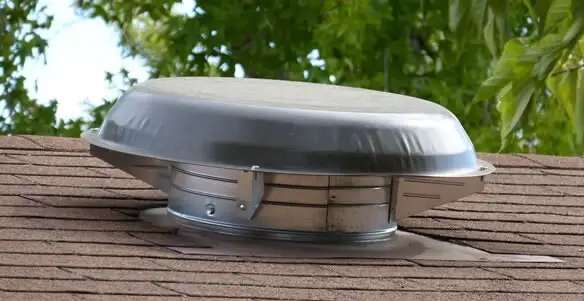 attic fan installation services with low-profile roof ventilation unit in Bellevue, WA