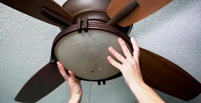 Ceiling fan repair and reinstallation on ceiling mount in Bellevue, WA