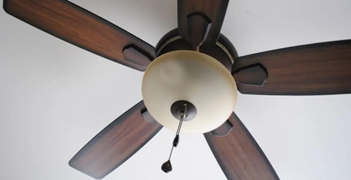 Fully installed ceiling fan with balanced blades and light fixture in Bellevue, WA