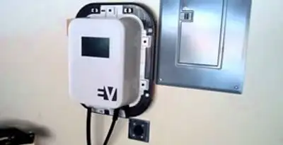 Electric car charger installation with wall-mounted EV charging station in Bellevue, WA
