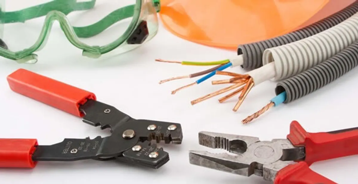 Electrical wiring repair with professional tools and safety equipment in Redmond, WA