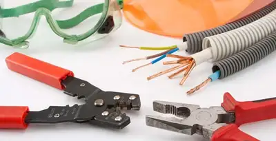 Electrical wiring repair with professional tools and safety equipment in Redmond, WA