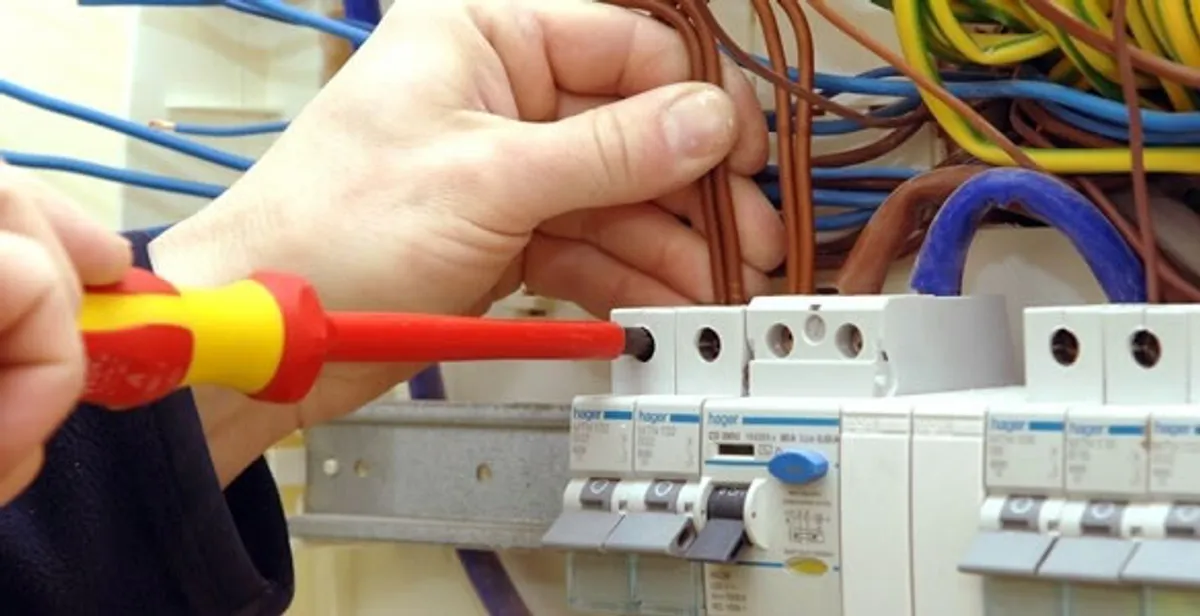 electrician services performing professional electrical panel wiring and connections in Bellevue, WA