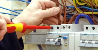 electrician services performing professional electrical panel wiring and connections in Bellevue, WA