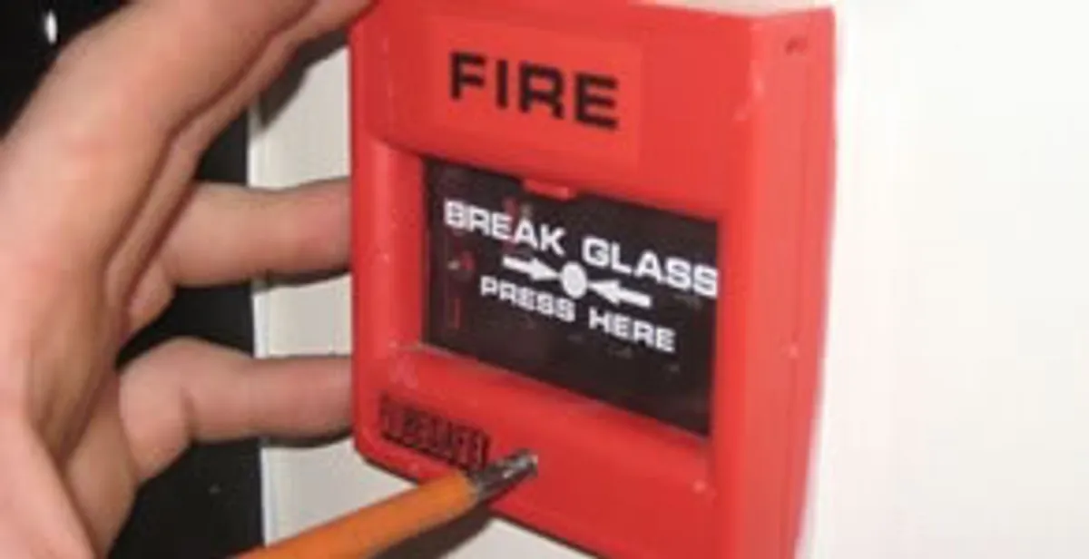 fire alarm installation service showing manual fire alarm pull station installed by licensed electricians in Bellevue, WA