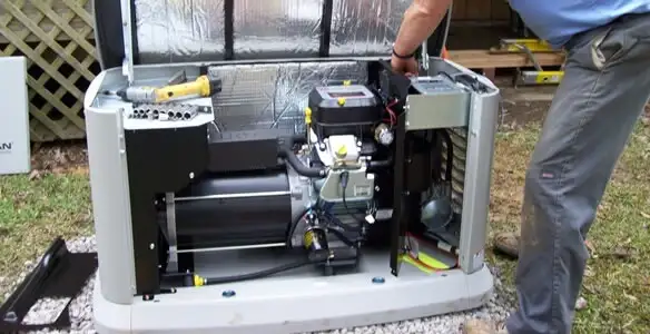 generator installation service showing technician connecting and configuring generator components in Bellevue, WA