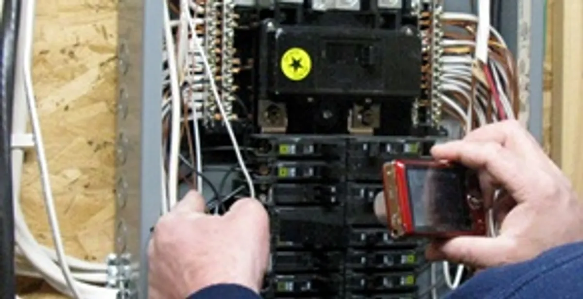 Home electrical inspection of circuit breaker panel by licensed electrician in Bellevue, WA