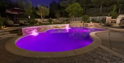 pool light installation and repair services illuminating a residential swimming pool in Bellevue, WA