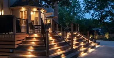 Residential electrician installing outdoor lighting for home safety in Bellevue, WA