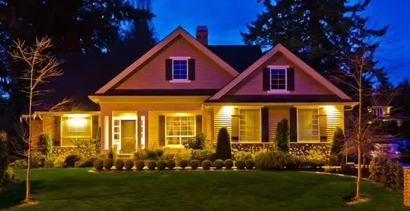 security light installation services illuminating a residential exterior at night in Bellevue, WA